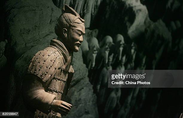 Terracotta warrior is displayed at the 'China's Memory -- 5,000 Years Cultural Treasure Exhibition', one of the five grand exhibitions held to mark...