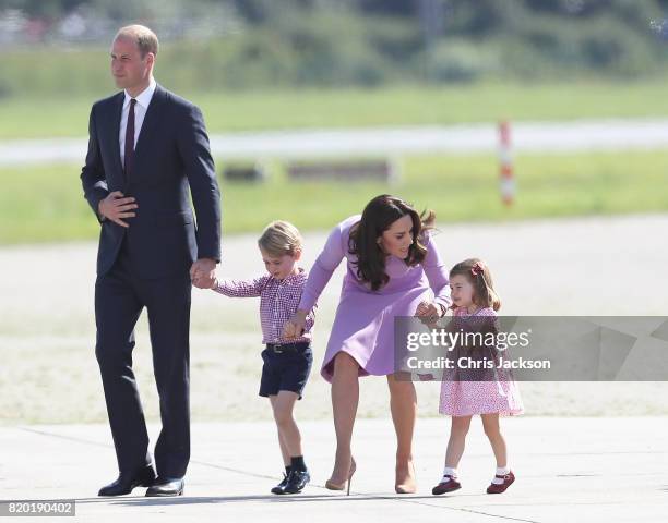 Prince William, Duke of Cambridge, Catherine, Duchess of Cambridge, Prince George of Cambridge and Princess Charlotte of Cambridge view helicopter...