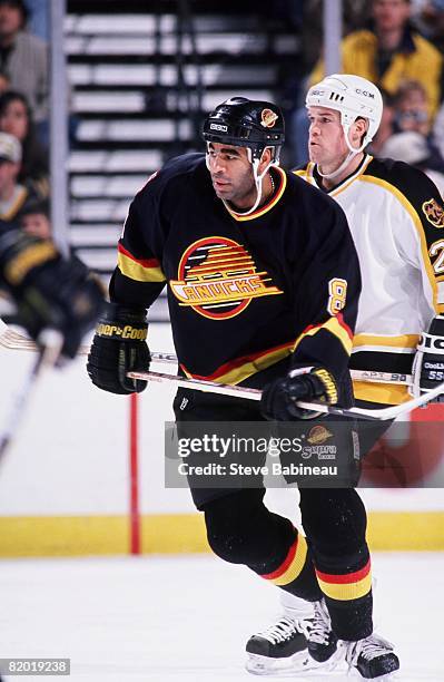 Donald Brashear of the Vancouver Canucks skates in game against the Boston Bruins at the Fleet Center.