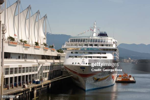 The Norwegian Sun cruise ship is docked at the Seaport in this 2008 Vancouver, British Columbia, Canada, urban landscape photo. This West Coast...