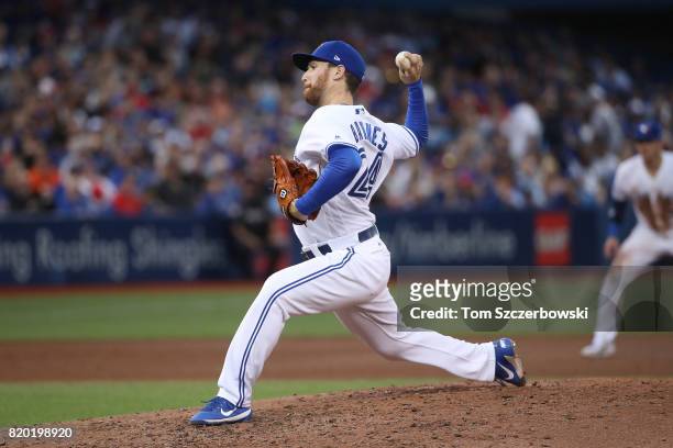 Danny Barnes of the Toronto Blue Jays delivers a pitch in the fifth inning during MLB game action against the Boston Red Sox at Rogers Centre on June...
