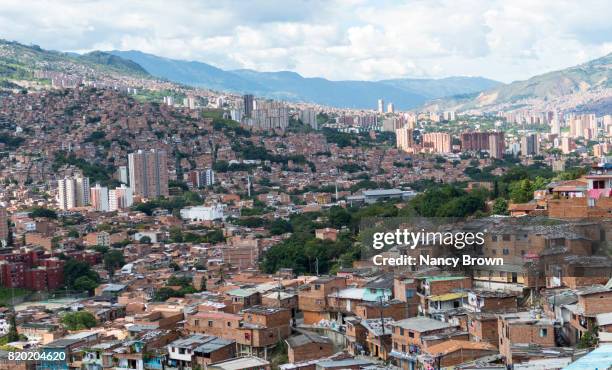 view of medellin colombia from the poorer area to the affluent part of the city. - medellin colombia stock pictures, royalty-free photos & images