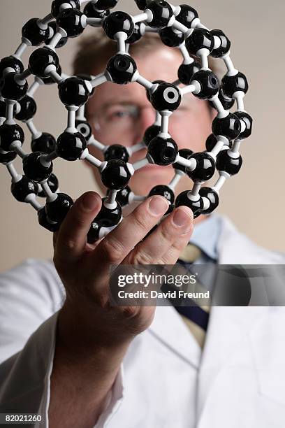 buckyball or fullerene molecular model.  - buckyball stock pictures, royalty-free photos & images