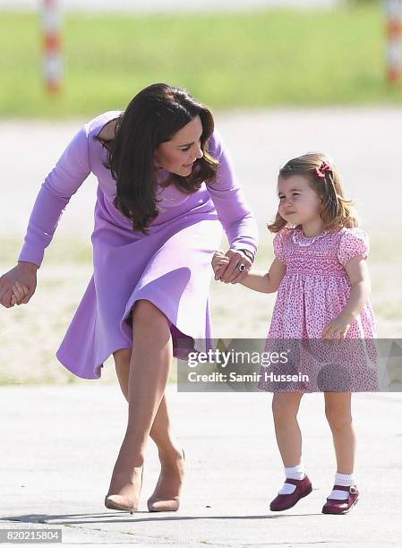 Prince William, Duke of Cambridge, Catherine, Duchess of Cambridge, Prince George of Cambridge and Princess Charlotte of Cambridge view helicopter...