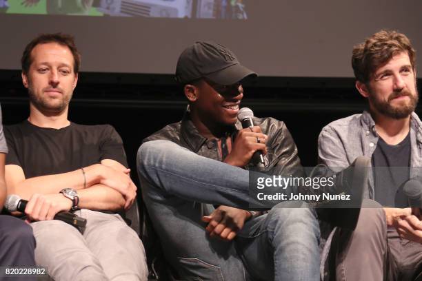 Dave Andron, Damson Idris and Carter Hudson attend the "Snowfall" New York Screening at The Schomburg Center for Research in Black Culture on July...