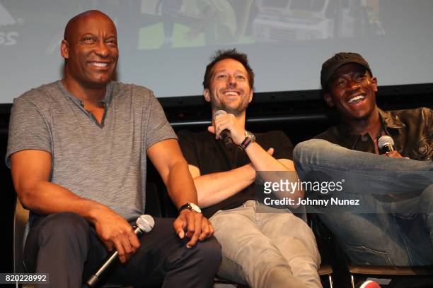 John Singleton, Dave Andron and Damson Idris attend the "Snowfall" New York Screening at The Schomburg Center for Research in Black Culture on July...