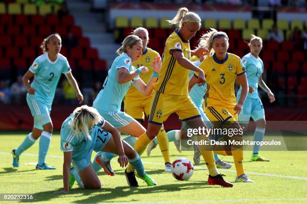 Caroline Seger of Sweden and Elena Morozova of Russia compete for the ball during the Group B match between Sweden and Russia during the UEFA Women's...