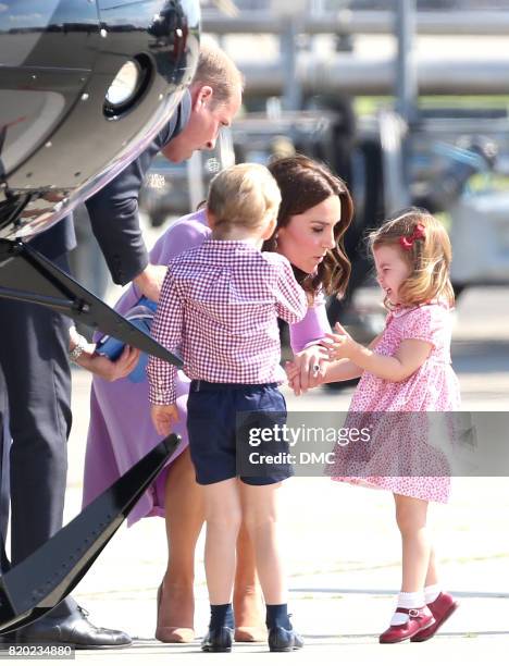 Princess Charlotte of Cambridge is seen crying after falling over, she is comforted by Catherine, Duchess of Cambridge as they visited the Airbus...