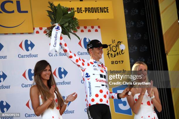 Warren Barguil of France riding for Team Sunweb in the king of the mountains jersey poses for a photo on the podium after stage 19 of the 2017 Le...