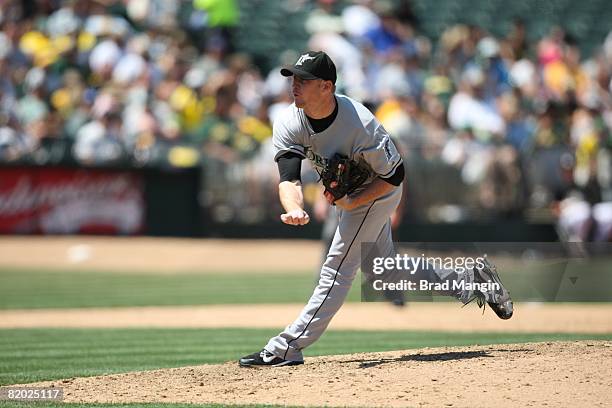 Logan Kensing of the Florida Marlins pitches during the game against the Oakland Athletics at the McAfee Coliseum in Oakland, California on June 22,...