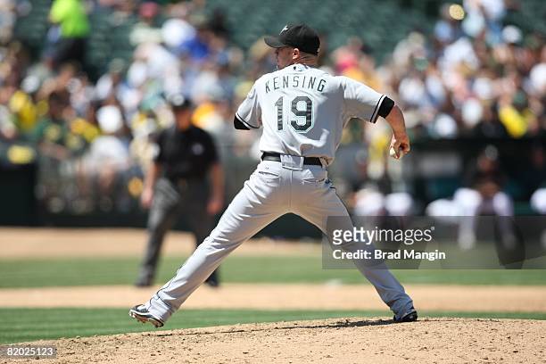 Logan Kensing of the Florida Marlins pitches during the game against the Oakland Athletics at the McAfee Coliseum in Oakland, California on June 22,...