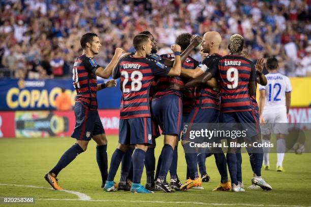 Omar Gonzalez of United States gets congratulated by teammates during the CONCACAF Gold Cup Match between U.S Men's National Team and El Salvador at...