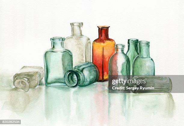 old pharmacy's glassware - green potion stock pictures, royalty-free photos & images