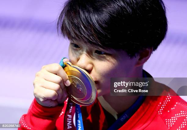 Gold medalist Tingmao Shi of China poses with the medal won during the Women's Diving 3m Springboard final on day eight of the Budapest 2017 FINA...