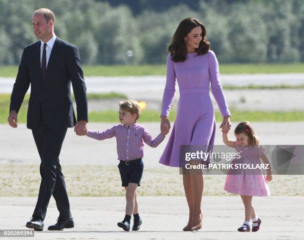 Britain's Prince William, Duke of Cambridge and his wife Kate, the Duchess of Cambridge, and their children Prince George and Princess Charlotte on...
