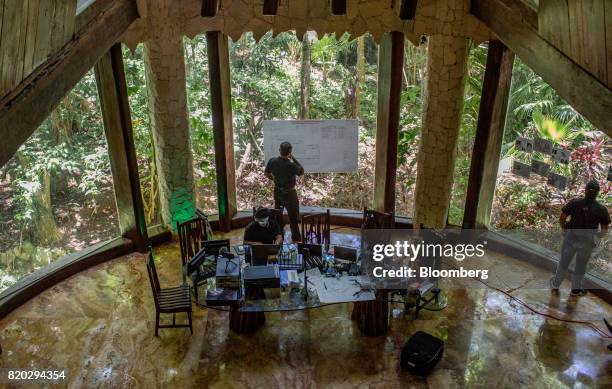 Team of computer experts and hackers work at a cabin in Playa del Carmen, Mexico, on Tuesday, July 11, 2017. The narco-traffickers already hold sway...