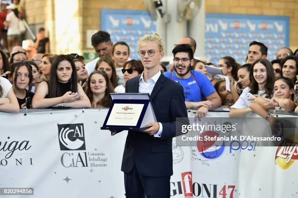 Ludovico Girardello poses with the Giffoni Exerience Award during Giffoni Film Festival 2017 on July 21, 2017 in Giffoni Valle Piana, Italy.