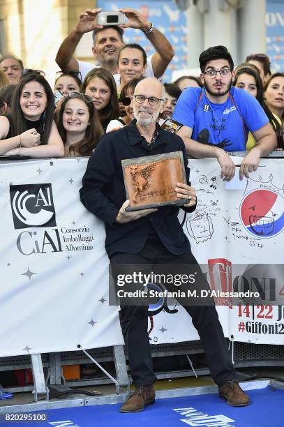 Gabriele Salvatores poses with the Francois Truffaut Award during Giffoni Film Festival 2017 on July 21, 2017 in Giffoni Valle Piana, Italy.