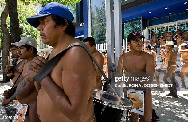 Peasants, members of the "400 Pueblos" movement, protest in Mexico City on July 21, 2008 against the dispossession of lands in the state of Veracruz,...