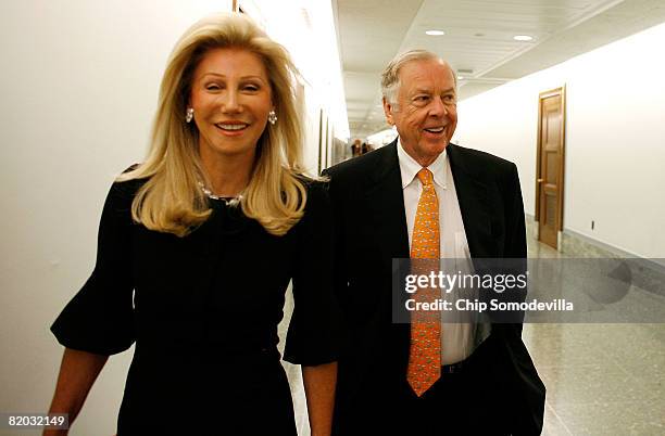 Oil billionaire T. Boone Pickens and his wife Madeleine Pickens arrive at the Dirksen Senate Office Building ahead of testifiying before the Senate...