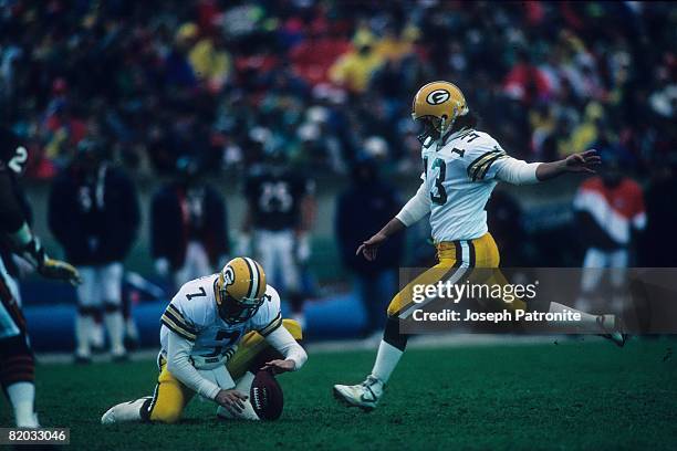 Kicker Chris Jacke of the Green Bay Packers kicks a field goal against the Chicago Bears at Soldier Field on November 22, 1992 in Chicago, Illinois....
