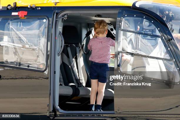 Prince George of Cambridge visits two airbus helicopters during an official visit to Poland and Germany on July 21, 2017 in Hamburg, Germany.