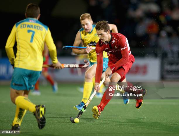 Felix Denayer of Belgium attempts to take the ball past Daniel Beale of Australia during the semi-final match between Australia and Belgium on Day 7...