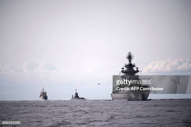 The Russian nuclear submarine Dmitrij Donskoj sails through Danish waters, near Korsor, on July 21 on it's way to Saint Petersburg to participate in...