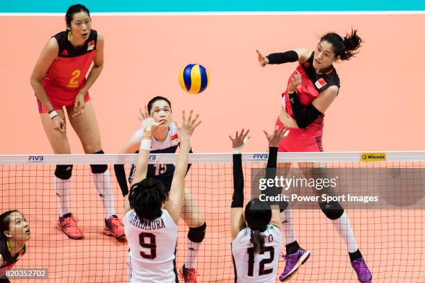 Wing spiker Xiaotong Liu of China spikes the ball during the FIVB Volleyball World Grand Prix match between China vs Japan on July 21, 2017 in Hong...