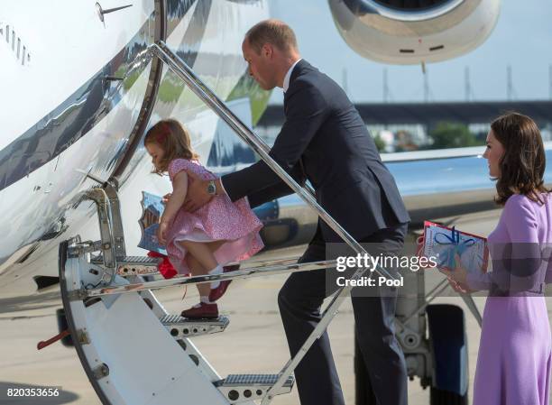 Prince William, Duke of Cambridge, Prince George of Cambridge, Princess Charlotte of Cambridge and Catherine, Duchess of Cambridge depart from...