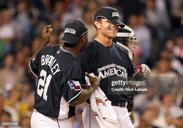 Milton Bradley teases Josh Hamilton during the 2008 MLB All-Star State Farm Home Run Derby at Yankee Stadium on July 14, 2008 in the Bronx borough of...