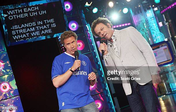 Actors Will Ferrell and John C. Reilly sing karaoke onstage during MTV's Total Request Live at the MTV Times Square Studios July 22, 2008 in New York...