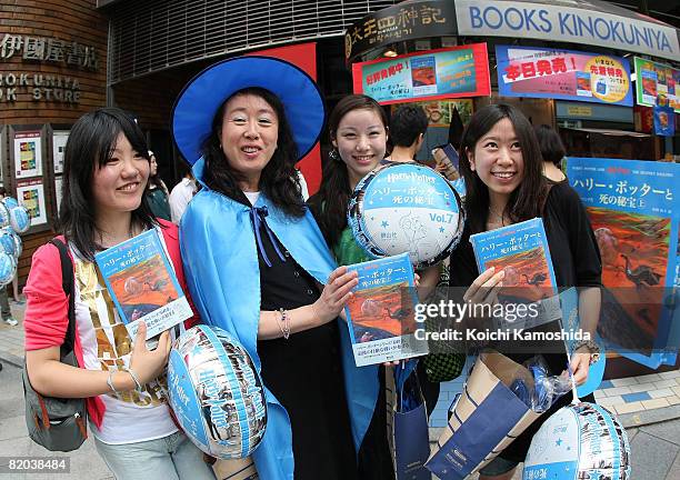Say-zan-sha President Yuko Matsuoka , who translated the series, poses with Harry Potter fans and newly published "Harry Potter and the Deathly...
