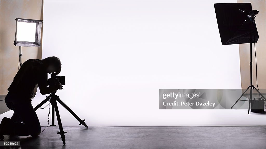 Photographer shooting in studio.