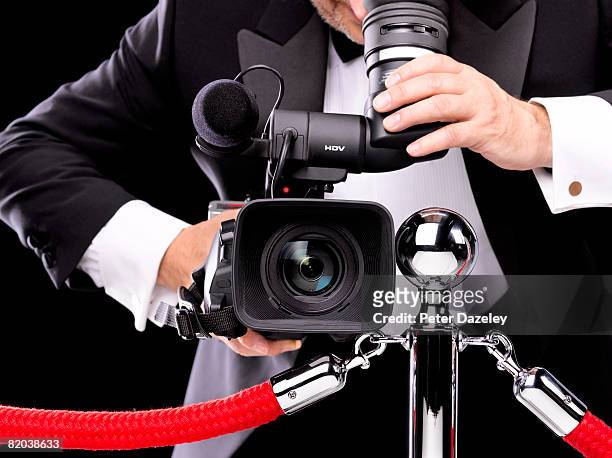 camera man in tuxedo filming at night. - one chance european premiere red carpet arrivals stock pictures, royalty-free photos & images