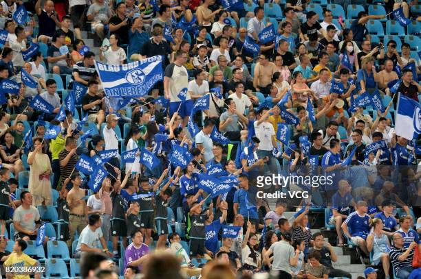 Fans of FC Schalke 04 cheer during the pre-season friendly match between FC Internazionale and FC Schalke 04 at Olympic Stadium on July 21, 2017 in...