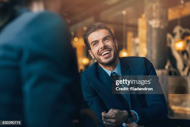 businessman in a meeting - socialite stock pictures, royalty-free photos & images