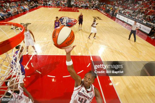 Shannon Johnson of the Houston Comets shoots the ball at Reliant Arena July 22, 2008 in Houston, Texas. NOTE TO USER: User expressly acknowledges and...