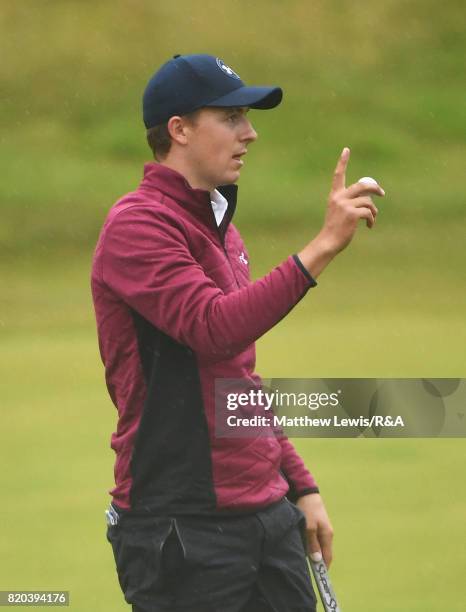 Jordan Spieth of the United States acknowledges the crowd on the 18th hole during the second round of the 146th Open Championship at Royal Birkdale...