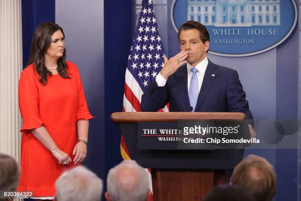 Anthony Scaramucci blows a kiss as he and White House Principal Deputy Press Secretary Sarah Huckabee Sanders conduct the daily White House press...