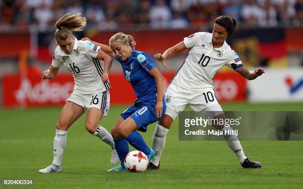 Linda Dallmann and Dzsenifer Marozsán of Germany and Valentina Cernoia of Italy compete for the ball during the Group B match between Germany and...