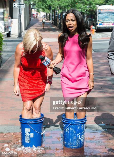 News Anchor Jennaphr Frederick and Co-host of Good Day Philadelphia Alex Holley are seen during a segment of Fox 29's 'Good Day' at FOX 29 Studio on...