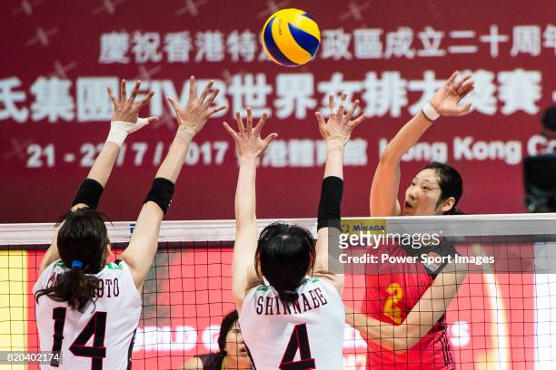 Wing spiker Ting Zhu of China spikes the ball during the FIVB Volleyball World Grand Prix match between China vs Japan on July 21, 2017 in Hong Kong,...