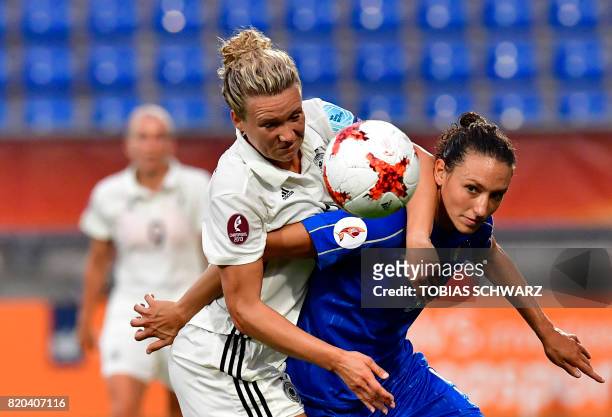 Italy's forward Ilaria Mauro vies with Germany's defender Josephine Henning during the UEFA Women's Euro 2017 football tournament between Germany and...