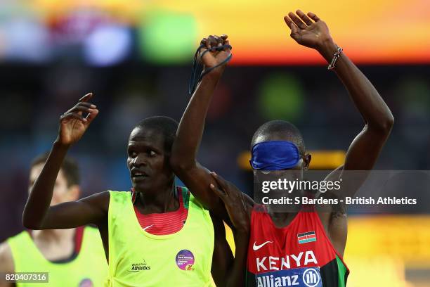 Samwel Mushai Kimani of Kenya celebrates after winning the Mens 1500m T11 final during day eight of the IPC World ParaAthletics Championships 2017 at...