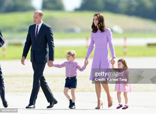 Prince William, Duke of Cambridge, Prince George, Princess Charlotte of Cambridge and Catherine, Duchess of Cambridge view helicopter models H145 and...