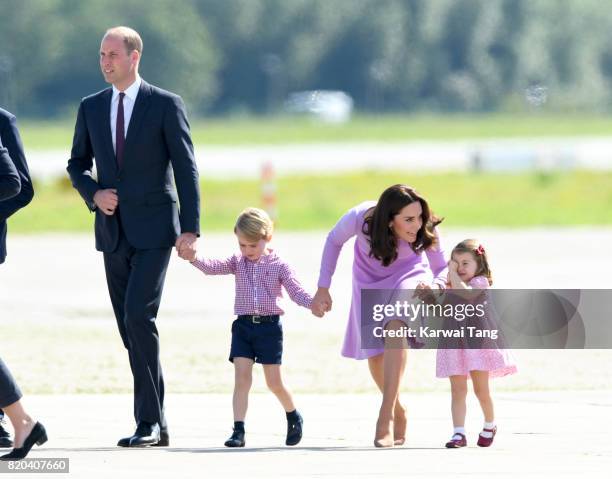 Prince William, Duke of Cambridge, Prince George, Princess Charlotte of Cambridge and Catherine, Duchess of Cambridge view helicopter models H145 and...