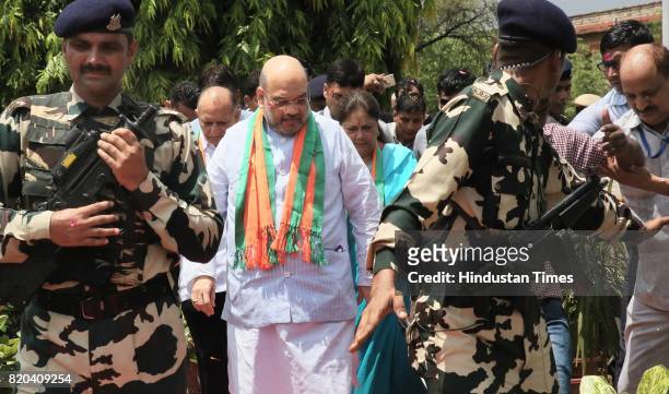 National President Amit Shah followed by CM Vasundhara Raje stops to pay tribute to Mahatma Gandhi, while on his way in a procession from Sanganer...
