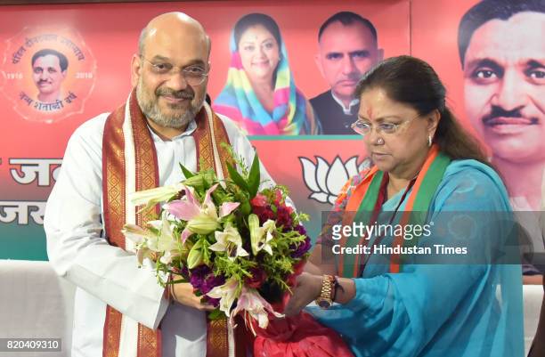 National President Amit Shah being welcomed by CM Vasundhara Raje at party office on the first day of his three-day visit on July 21, 2017 in Jaipur,...