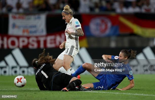 Anja Mittag of Germany is tackled by Laura Giuliani, goalkeeper of Italy during the Group B match between Germany and Italy during the UEFA Women's...